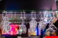 Glasses in shelf above a bar rack Royalty Free Stock Photo