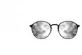Glasses with smoke reflection in the lenses. Space for text. Royalty Free Stock Photo