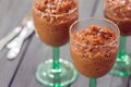 Glasses of Smooth Chocolate Milk Rice Pudding on Dark Wooden Background, Horizontal, Close-up