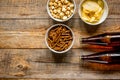 Glasses, snacks, beer for whatchig film on wooden background top view space for text