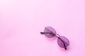 Glasses or sunglasses object fashion minimal modern style, accessory travel on Pink pastel color background. Royalty Free Stock Photo