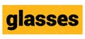 glasses text written on yellow-black stamp sign