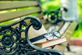 glasses on a thick book and a straw hat forgotten Royalty Free Stock Photo