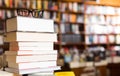 Glasses on top of different books lying on table in school libra Royalty Free Stock Photo