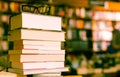 Glasses on top of different books lying on table in school libra Royalty Free Stock Photo