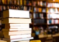 Glasses on top of different books lying on table in school library Royalty Free Stock Photo