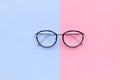 Glasses on two color pastel background.holiday concept