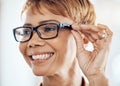 Glasses, vision and face with a woman customer shopping for a new frame in an optometry store. Retail, fashion and