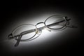 Glasses on white background in the darkness Royalty Free Stock Photo