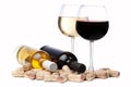 Glasses of white and red wine and corks