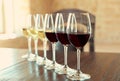 Glasses of white and red wines