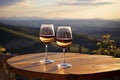 Glasses of white, wine on an old wooden barrel in the vineyard Royalty Free Stock Photo