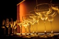 Glasses of wine. Glasses hanging above the bar in the restaurant. Empty glasses for wine Royalty Free Stock Photo