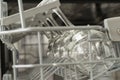 Glasses of wine are stacked rhythmically in the dishwasher Royalty Free Stock Photo
