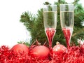 Glasses of wine and tree and red Christmas balls Royalty Free Stock Photo