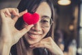 Glasses women hand holding heart for love and care your eyes concept Royalty Free Stock Photo