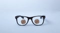 Glassless lenses with two virtual currencies which you can exchange for coupons in some commercial establishments