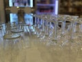 Glassware arrangement with empty wine glasses and beer glasses in bar setting background Royalty Free Stock Photo