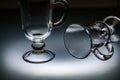 glassware for tea mulled wine coffee illuminated by light from below on frosted glass