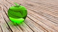 Glassy apple, glowing apple, 3d model.Green glass apple on a brown wooden table