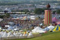 Glastonbury Festival 06.27.2015. Looking out at the Ribbon Tower and teepee field at Glastonbury Festival Royalty Free Stock Photo