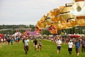 Glastonbury music festival sunny day crowds music tents