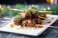 glazed beef teriyaki meatballs stacked on a platter Royalty Free Stock Photo