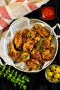 Glazed chicken drumsticks and wings Royalty Free Stock Photo