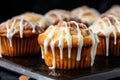 Glazed Cinnamon Muffins on Wooden Tray