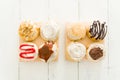 Delicious sweet pastries on a wooden kitchen table