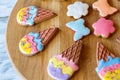 Glazed cookies on wooden board. Royalty Free Stock Photo