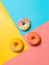 Glazed donuts on colorful background, top view Royalty Free Stock Photo