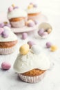 Glazed Easter cupcakes decorated with mini chocolate eggs Royalty Free Stock Photo