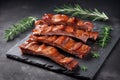 glazed pork ribs on a minimalist gray background