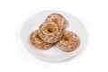 Glazed ring shaped spice cookies on a white dish Royalty Free Stock Photo