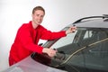 Glazier removing windshield Royalty Free Stock Photo