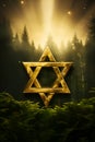 A gleaming golden Star of David stands in a forest, commemorating Holocaust Memorial Day