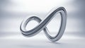 Gleaming Silver Infinity Symbol Floating in a Bright Studio with Subtle Reflections Royalty Free Stock Photo