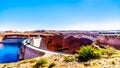 The Glen Canyon Dam with Lake Powell behind the dam, created by the Colorado River Royalty Free Stock Photo