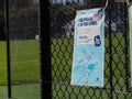 Signs warning about hand hygiene due to covid19 at a cricket sporting pitch