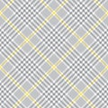 Glen plaid pattern in grey, yellow, white. Tweed check plaid tartan background texture for jacket, skirt, blanket, duvet cover. Royalty Free Stock Photo