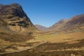 Glencoe Valley Scotland UK famous Scottish glen with mountains in Scottish Highlands in spring with clear blue sky Royalty Free Stock Photo