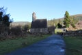 GLENDALOUGH, IRELAND - February 20 2018: The ancient cemetery in monastic site Glendalough. Glendalough Valley, Wicklow Mountains Royalty Free Stock Photo