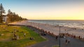 Glenelg Beach with people walking along at sunset Royalty Free Stock Photo