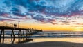 Glenelg Beach pier with people silhouette at sunset