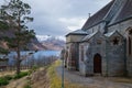 Glenfinnan Church with Loch Shiel Lake view and snowy Highlands Royalty Free Stock Photo