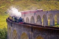 Glenfinnan railway viaduct in Scotland with the Jacobite steam train, located at the northern end of Loch Shiel of great scenic