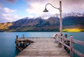 Glenorchy wharf wooden pier and lamp after sunrise Royalty Free Stock Photo