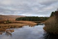 Glenveagh National Park, Co. Donegal. view of lake between mountains. Mountain scene with cloudy sky