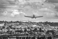 Glider aero tow with tug landing behind monochrome Royalty Free Stock Photo